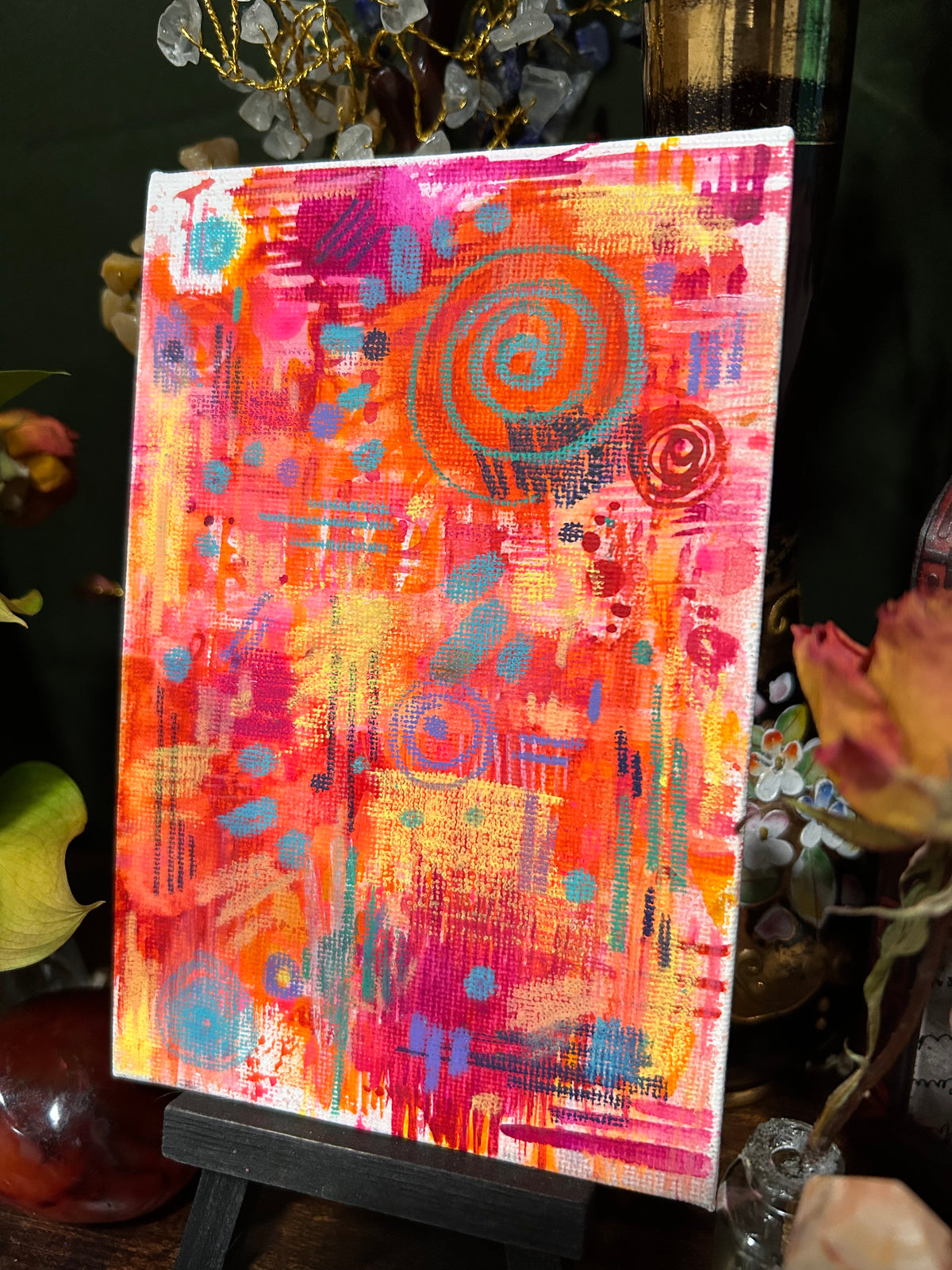  right side full view of original abstract watercolor painting on a flat canvas called “Better Times Are Here” full of dotted patterns, geometric shapes and vibrant colors of pinks and yellows. on a textured canvas