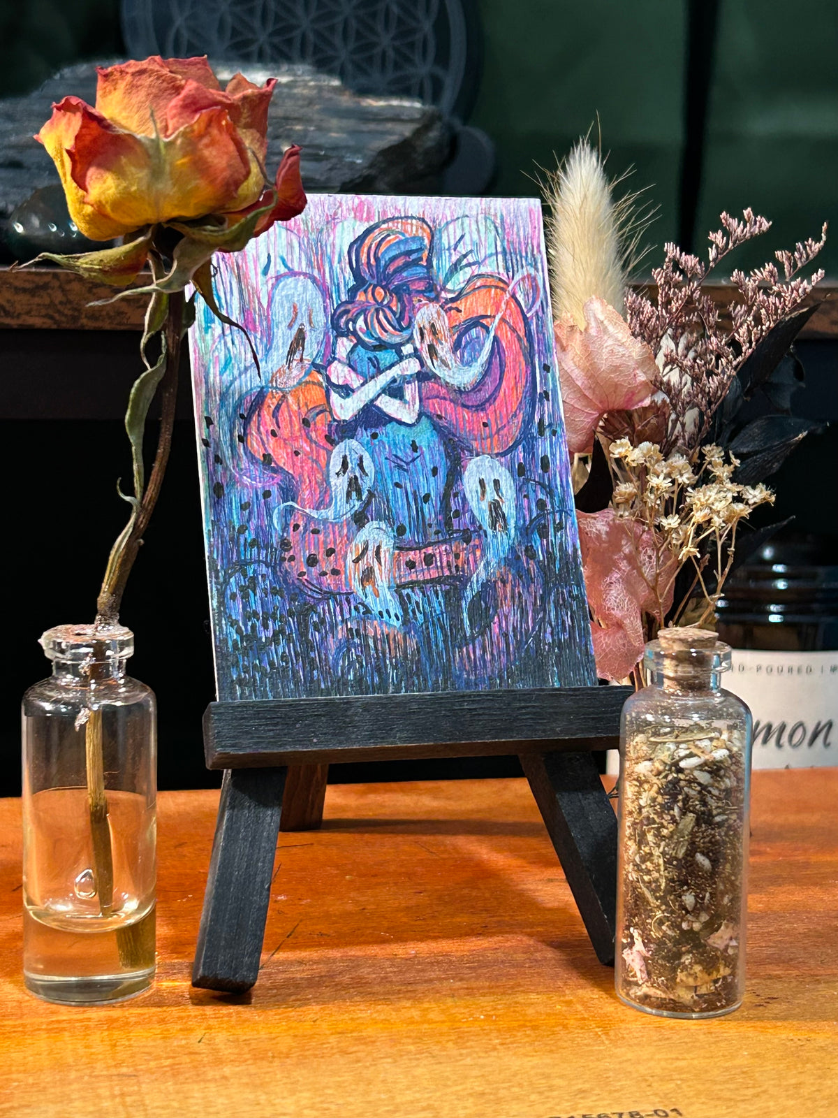 original character ACEO art card scene, displayed on a studio easel.